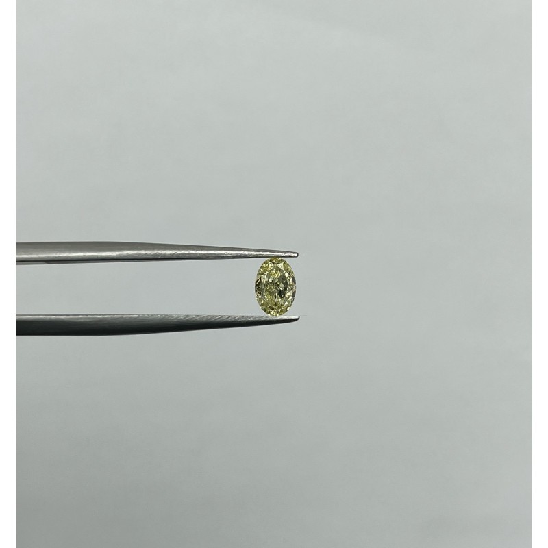 Diament o barwie fantazyjnej szlif owalny, 0.72ct, VS2, Yellow, IGI 702557931